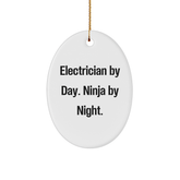 Electrician Gifts by Day, Ninja Gifts by Night, Oval Ornament Christmas Decor - Image 1